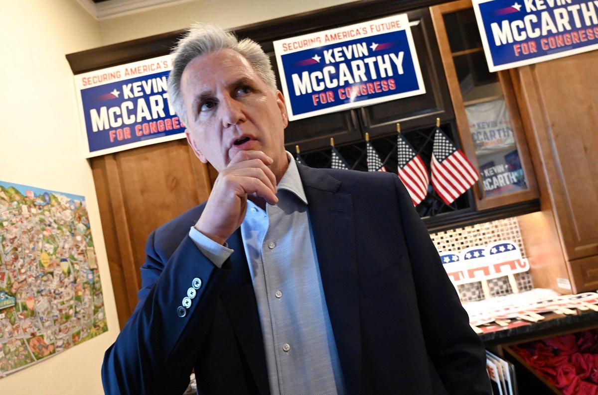 Congressman Kevin McCarthy (R) answers questions from the media as he attends the grand opening of his new headquarters Saturday, March 19, 2022 in Clovis.