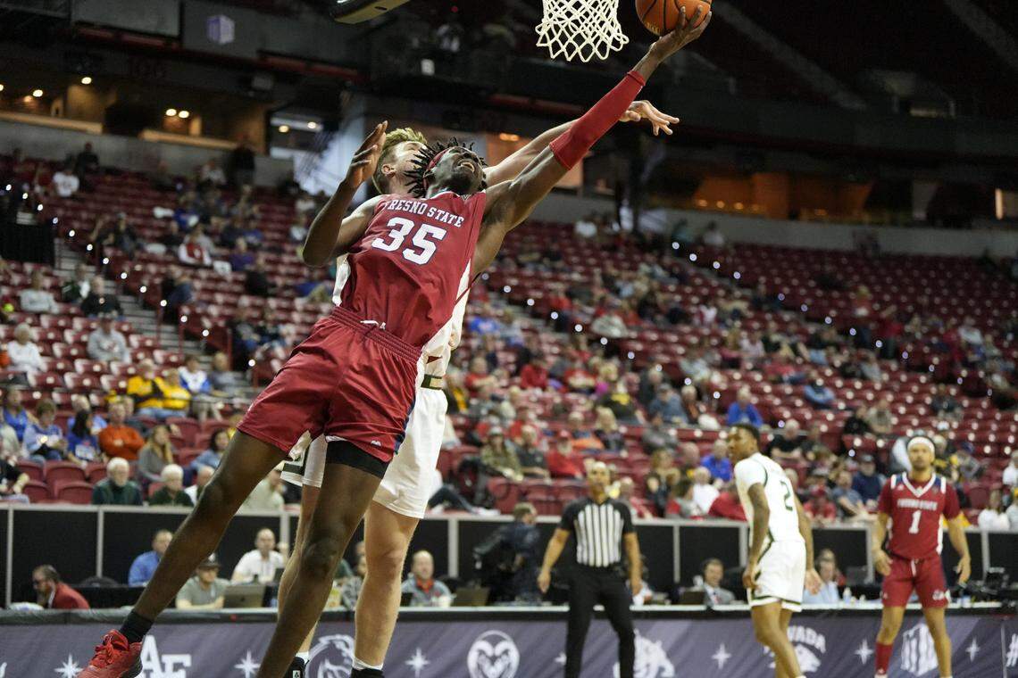 Fresno State center Eduardo Andre scores on a layup in the Bulldogs’ 67-65 loss to Colorado State in the first round of the Mountain West Conference Tournament Wednesday at the Thomas & Mack Center in Las Vegas. Andre had a double-double with 20 points and 10 rebounds.