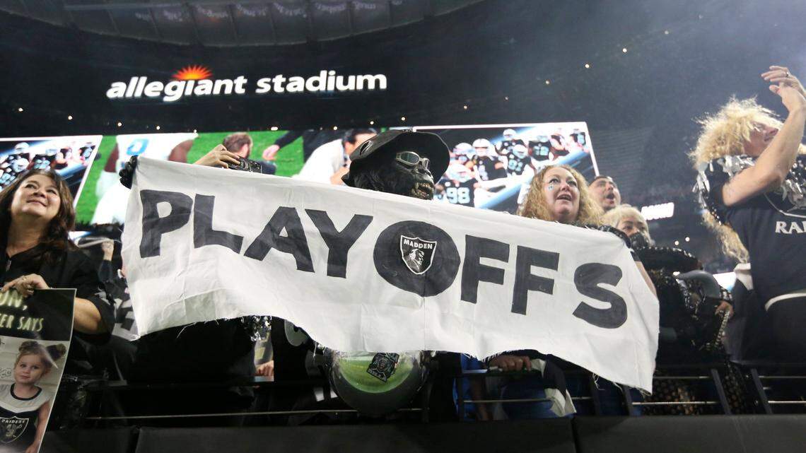 Las Vegas Raiders fans cheer during overtime of an NFL game between the Las Vegas Raiders and the Los Angeles Chargers, Sunday, Jan. 9, 2022, in Las Vegas.