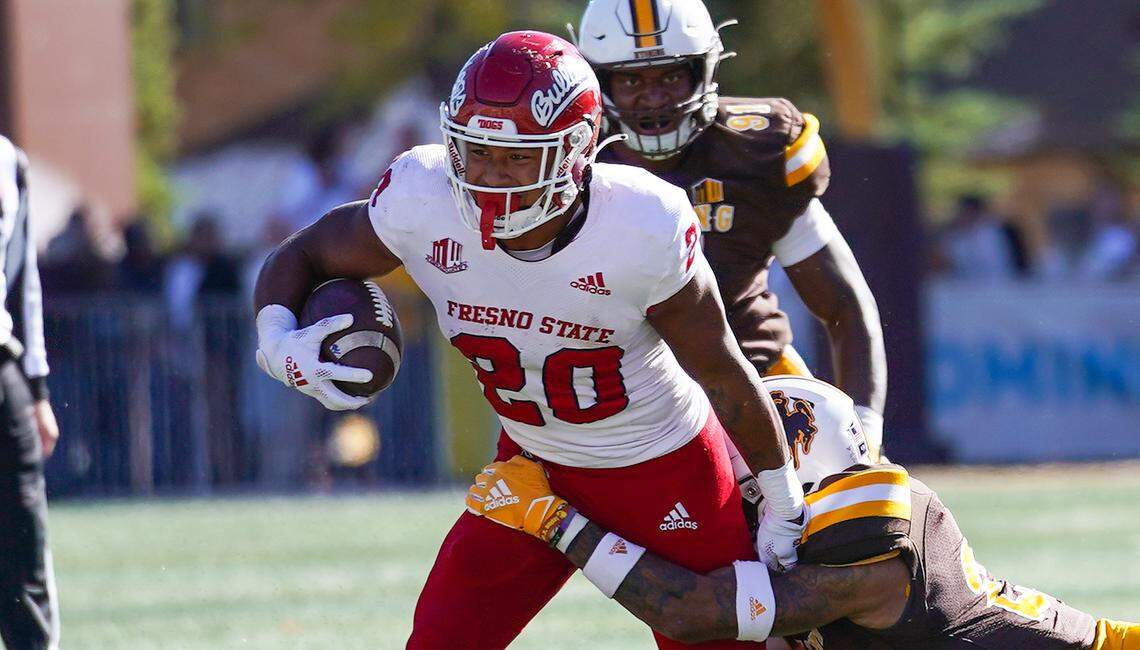Fresno State Bulldogs running back Ronnie Rivers runs through a tackle in a 17-0 victory over the Wyoming Cowboys at War Memorial Stadium in Laramie, Wyo. Rivers rushed for 73 yards on 22 plays and also caught four passes for 19 yards in the win.