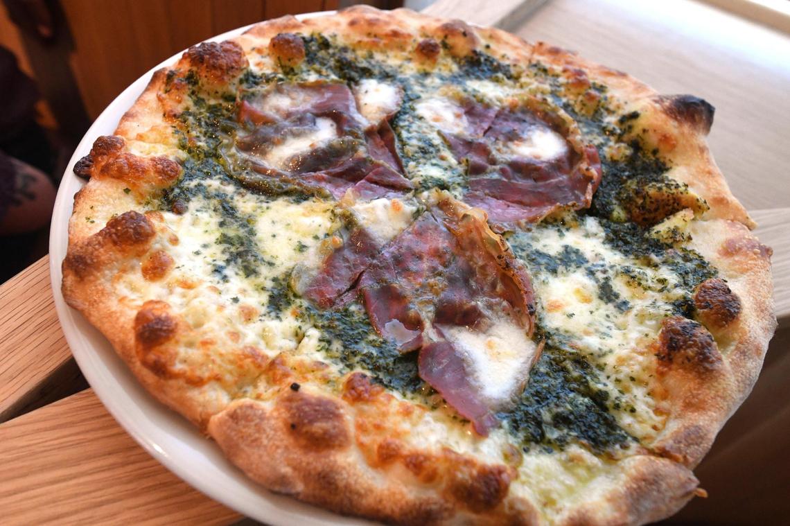 One of the handcrafted pizzas, this one featuring prosciutto&nbsp;and basil, at the new Annesso Pizzeria.