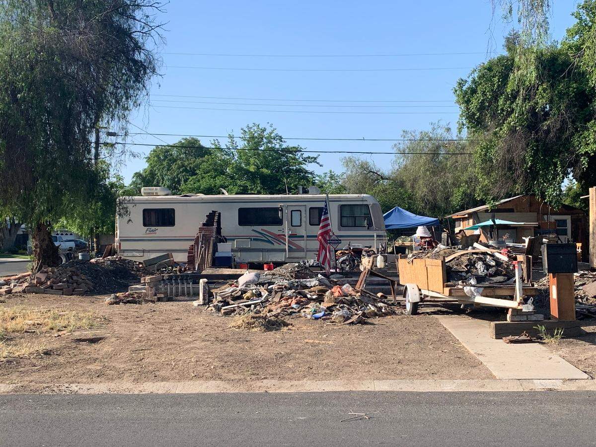 Still a mess: A lot at the corner of North Harrison Avenue and East Sussex Way remained full of debris on Wednesday, April 27, 2022, nearly two and one-half years after a fatal fire killed two there in December of 2019.