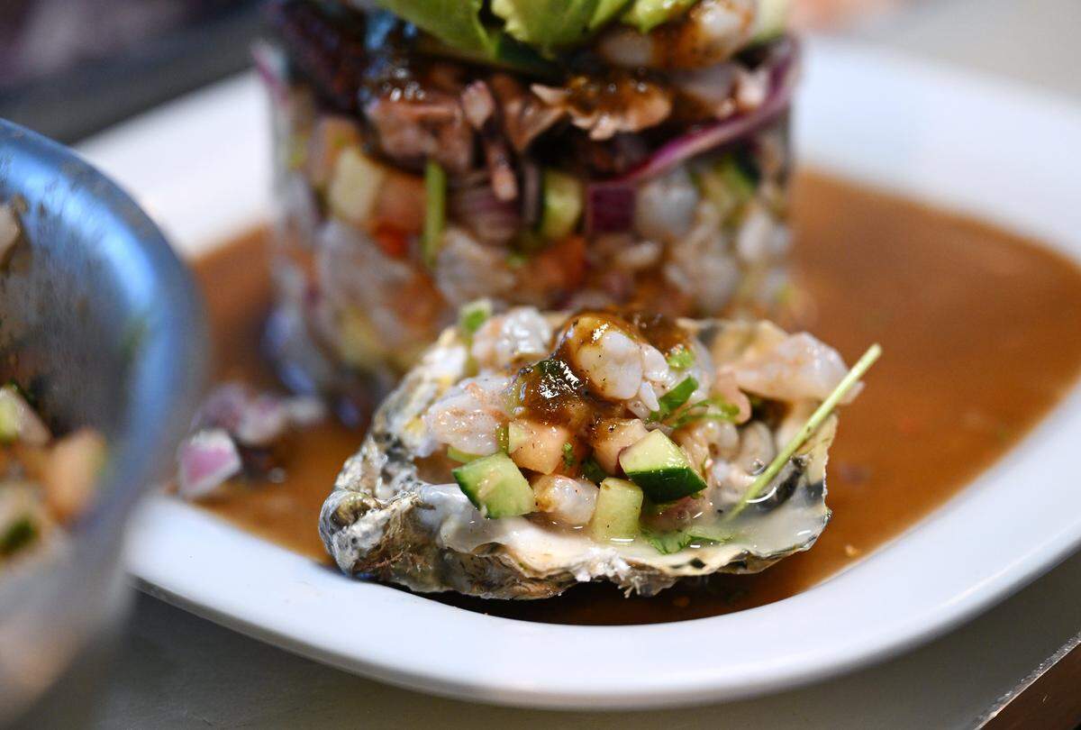 A stuffed oyster seen with an El Botanero Torre at El Botanero Mariscos Wednesday, August 6, 2025 in Fresno.