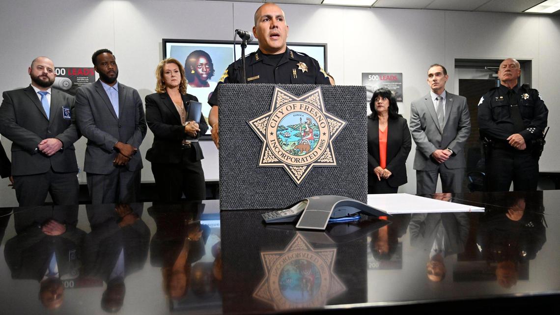 Fresno Chief of Police Paco Balderrama, center, announces the arrest of a suspect in the 1987 murder of Jacqueline Henry. Modern DNA methods helped police make the arrest.