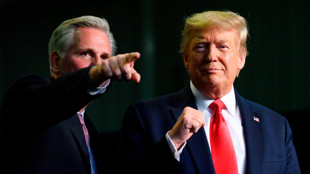 Then-President Donald Trump, right, gestures next to Rep. Kevin McCarthy, R-Bakersfield, as they deliver remarks to Rural Stakeholders on California Water Accessibility in Bakersfield in 2020.