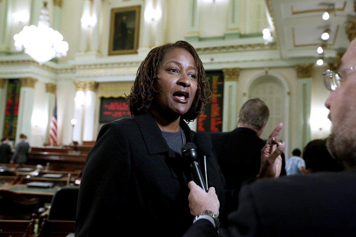 State Sen. Holly Mitchell (D-Los Angeles) speaks to the media in Sacramento, Calif. on Jan. 24, 2017. (Gary Coronado/Los Angeles Times/TNS)