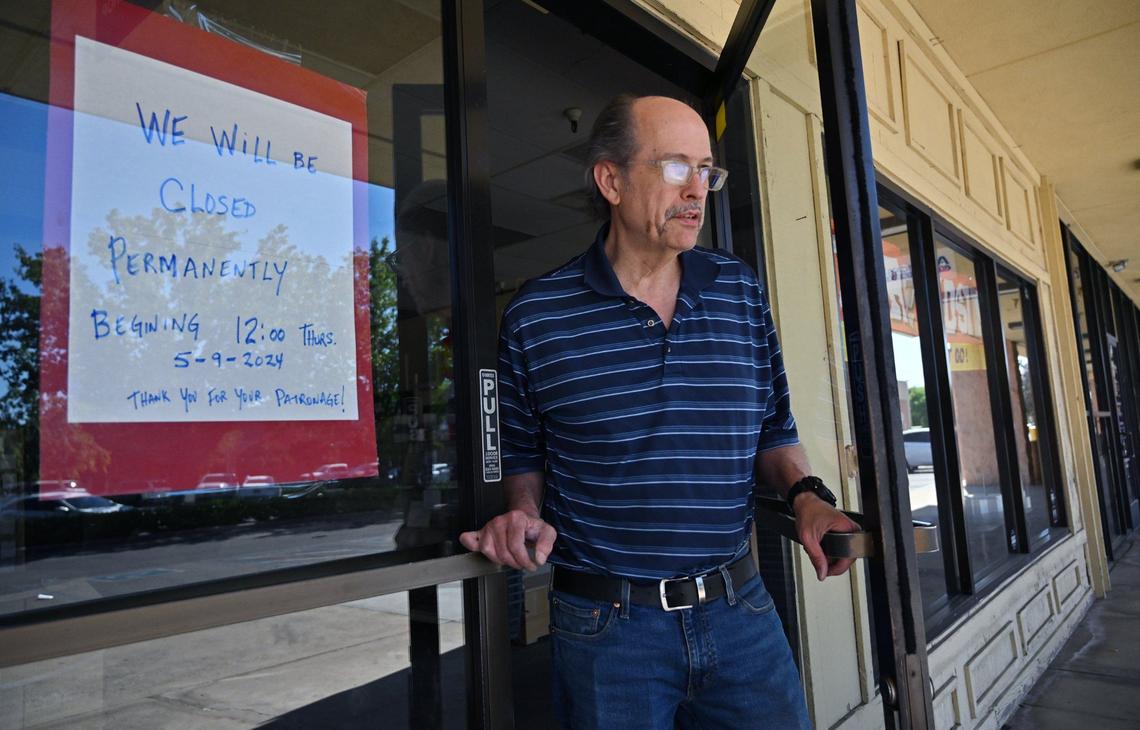Tom Pearce, owner of Margie’s Hallmark Shop, continues clearing out the store his parents opened 37 years ago near Clovis Ave.nuend Kings Canyon Road Friday morning in Fresno. After decades of service, Pearce has closed the shop.