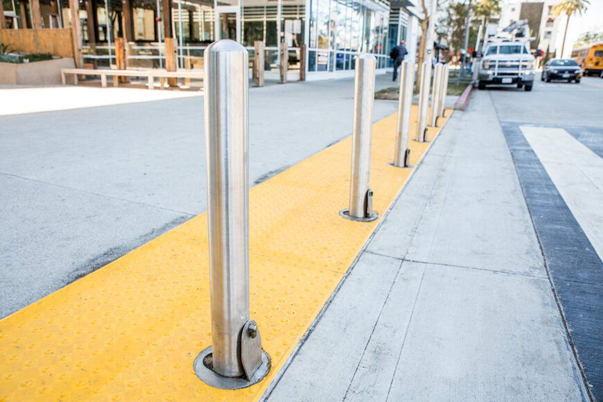 Stainless streel removal bollards (similar to the ones pictured) were purchased for the reopening of Fulton Street in downtown Fresno. They have never been used and have since gone missing.