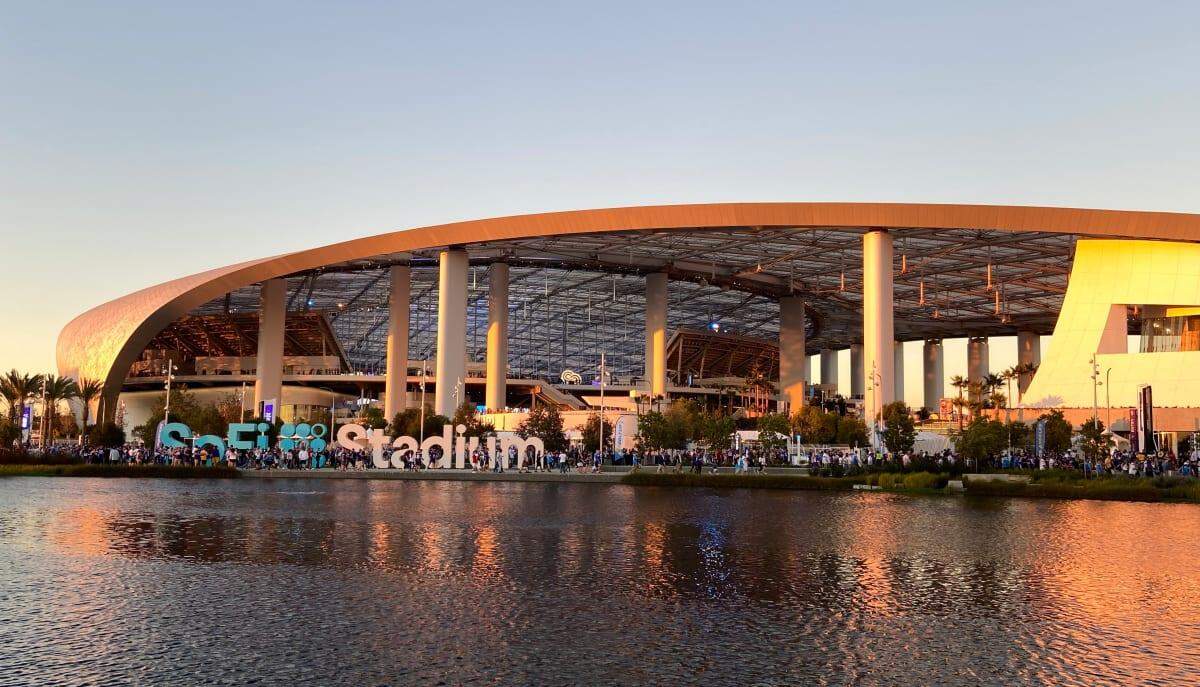 Located on the site of the former Hollywood Park racetrack, the stadium is the centerpiece of a 298-acre mixed-use development featuring retail, commercial office space, a hotel, residential units, and outdoor park spaces.