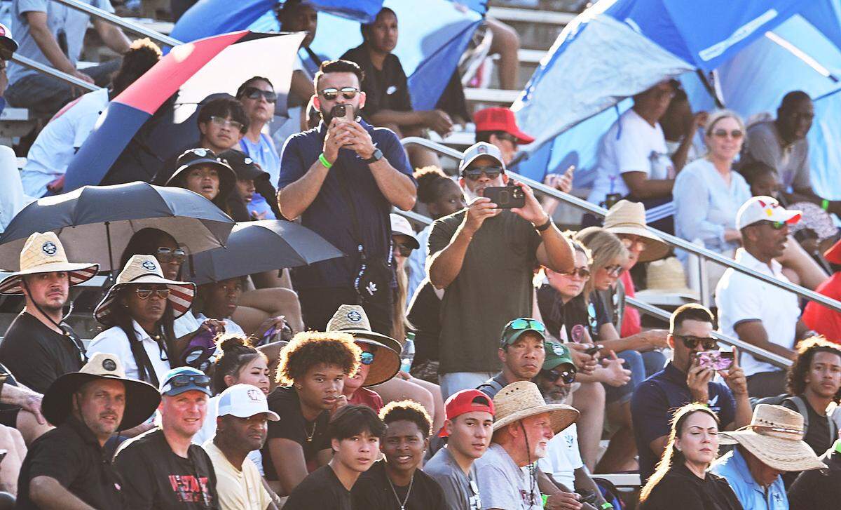 Spectators watch qualifying action at the CIF track & field championships at Veterans Memorial Stadium in Clovis, California, on Friday, May 30, 2025.