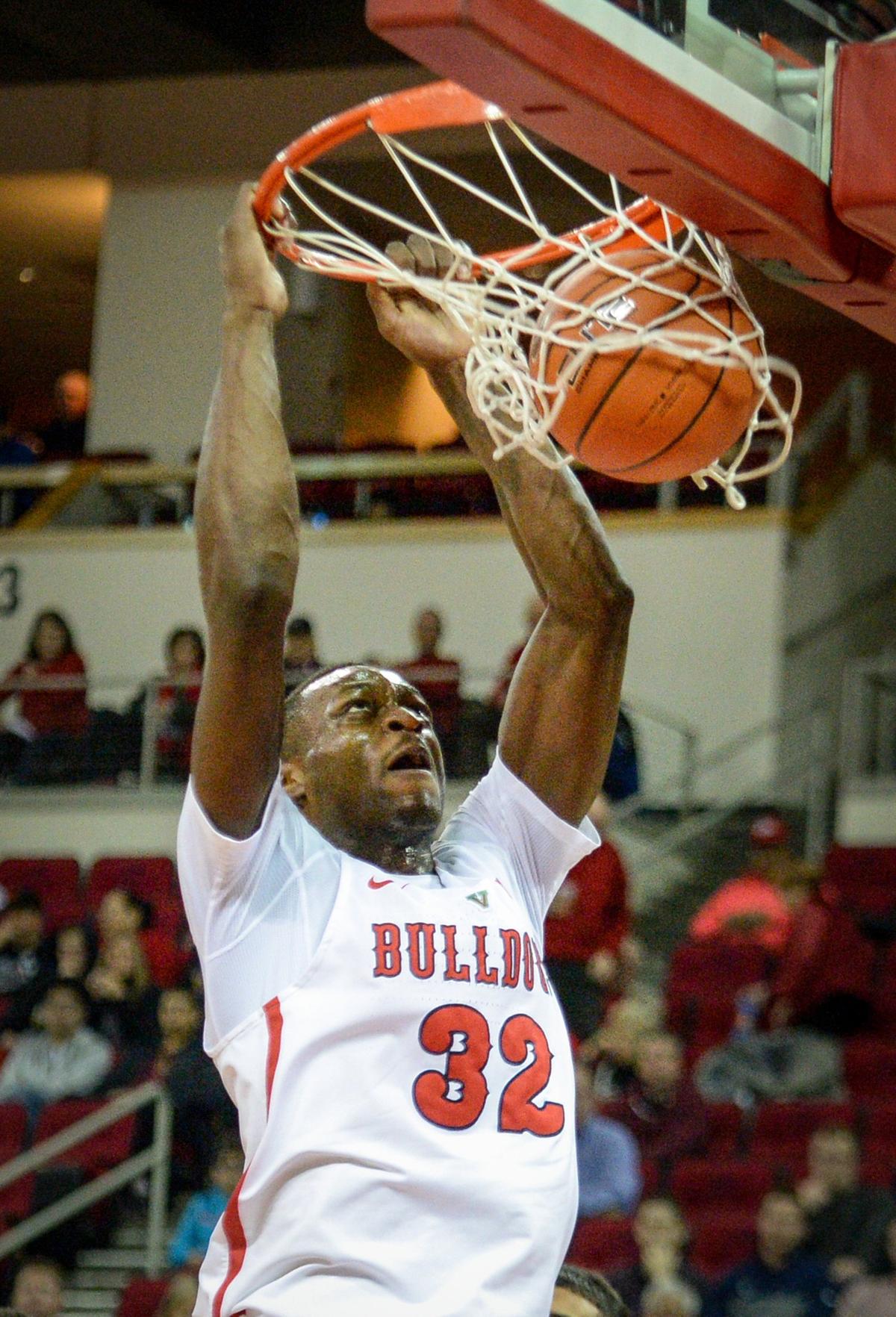 Fresno State’s Nate Grimes dunks against San Diego State in their game at the Save Mart Center on Tuesday, Jan. 22, 2019.
