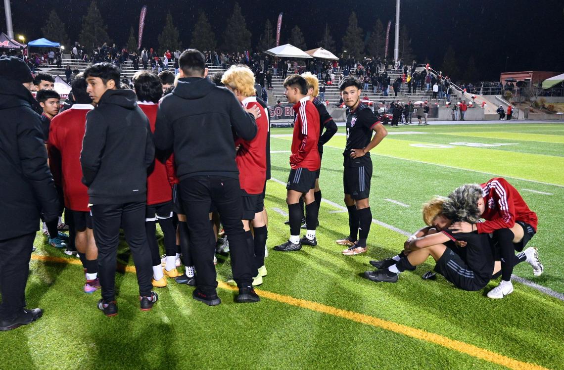 McLane’s Marcos Samaniego, right, is consoled after Terra Linda 2-0 win for the CIF Northern California Regional Division III boys soccer championship Saturday, March 4, 2023 in Fresno.