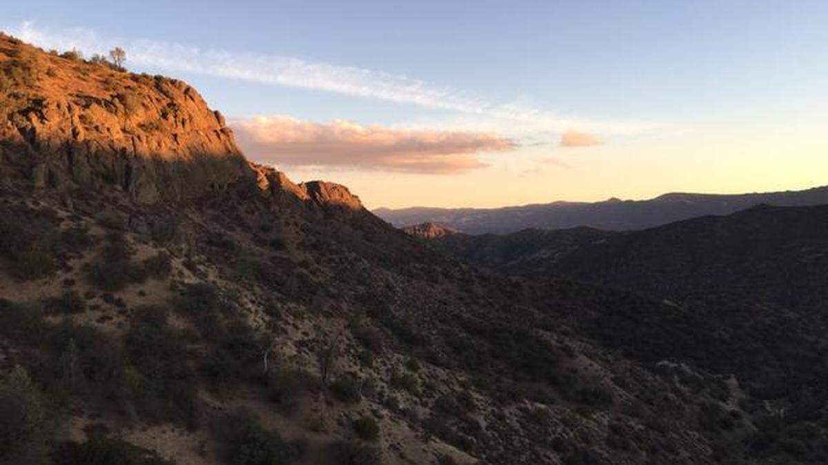 The sky turns shades of orange as the sun begins to set along the Coalinga Mineral Springs National Recreation Trail in west Fresno County. The 2.5-mile hike to the top of Kreyenhagen Peak offers splendid panoramic views of the San Joaquin Valley and Diablo Mountain Range.
