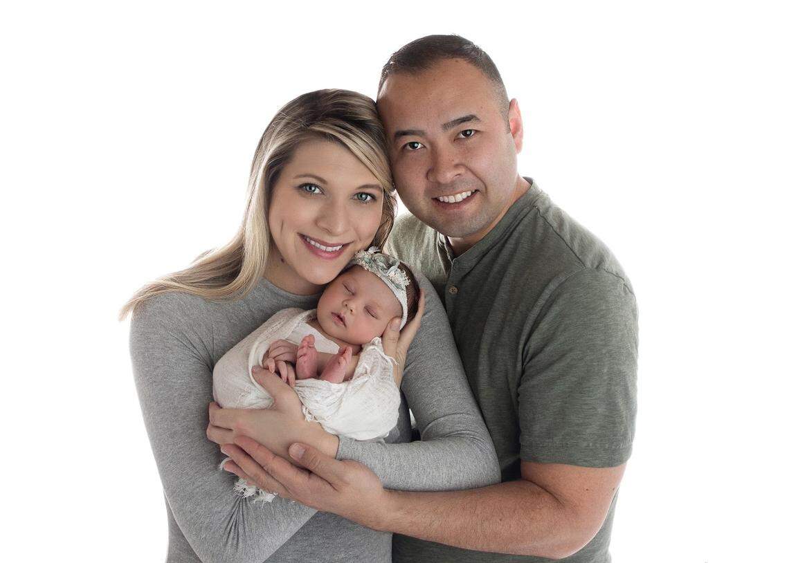 Heather and Andrew Janz with their newborn daughter, Wilhelmina Rose Janz, who was born Jan. 28.