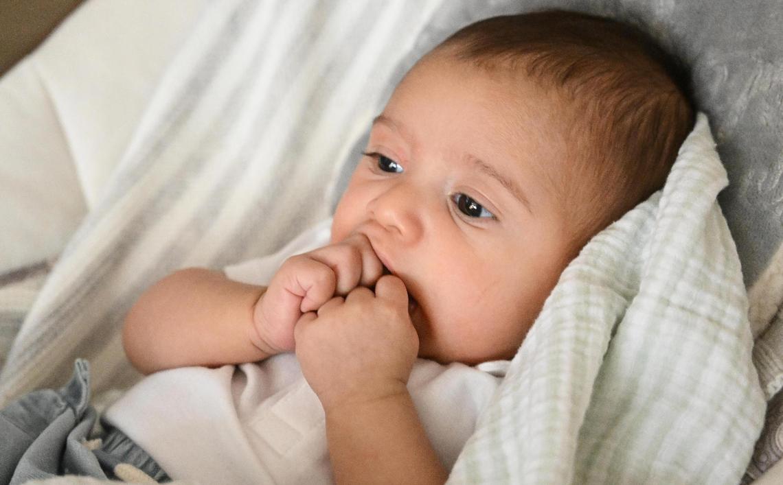 Maximus Gonzalo Carrasco, the son of fallen Selma police officer Gonzalo Carrasco Jr, who died in the line of duty last January 31, sits in his bouncer chair at the home of his mother, Karla Alvarez, in Dinuba on Tuesday, May 9, 2023. Baby Max was born on Feb. 27, just about a month after his father’s murder.