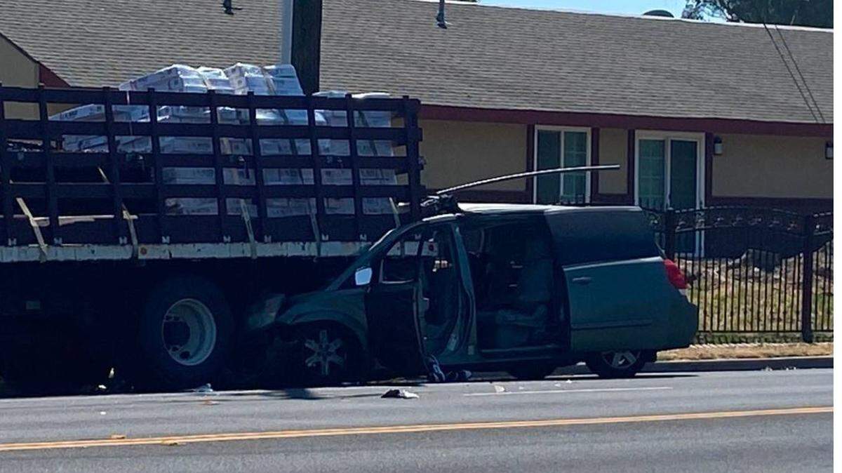 Fresno police reported that a 30-foot truck, marked by traffic cones, was blocking one lane of Marks Avenue when a minivan collided with the rear of the vehicle, killing the minivan driver Friday.