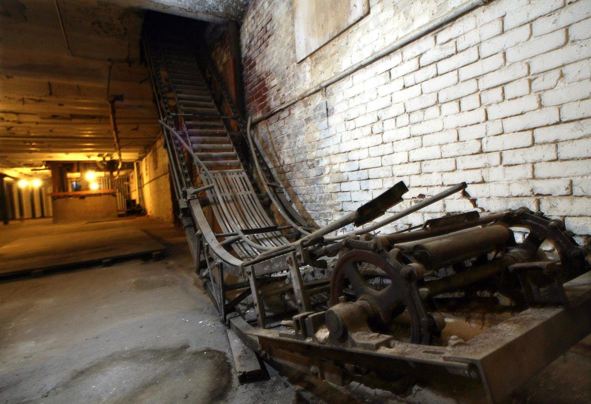 Part of a mechanized conveyor system left behind in the basement of the old Fresno Brewing Co. building, which also houses the office.