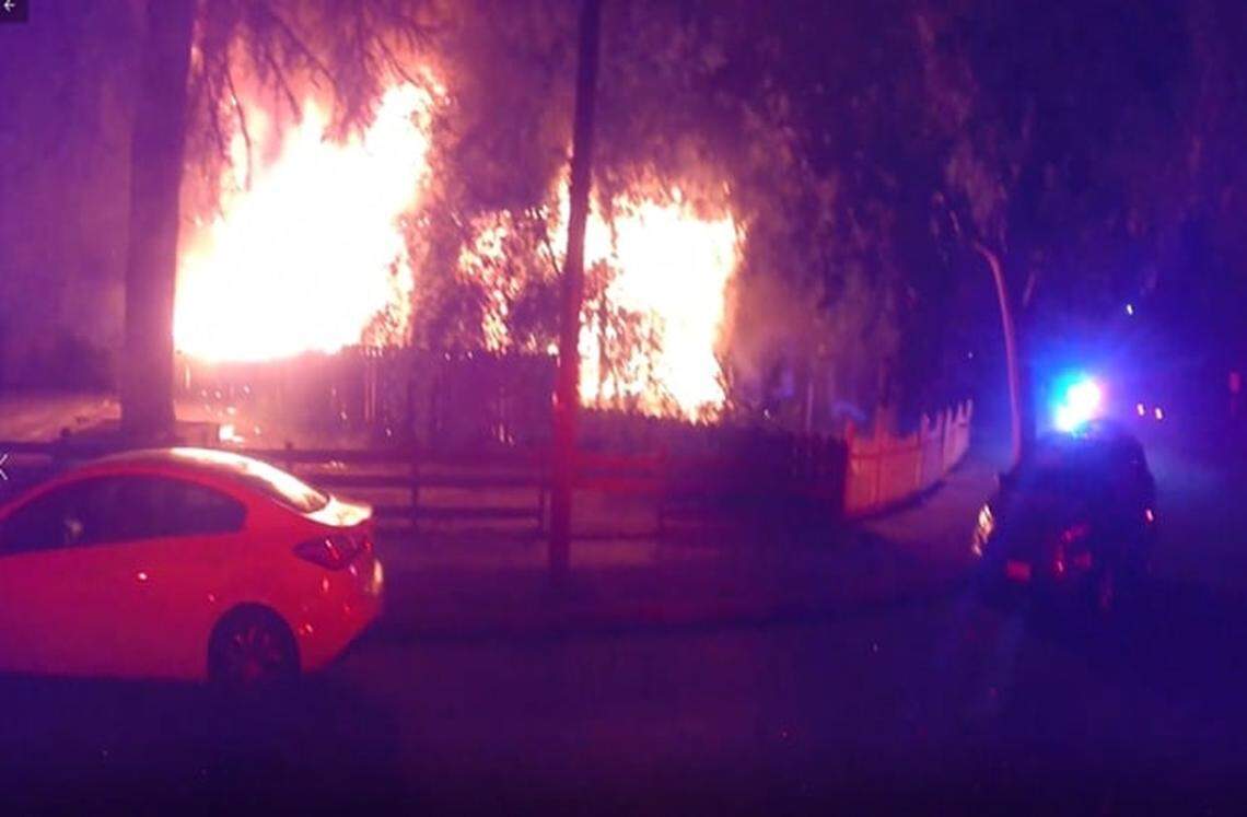A home burns near College and McKenzie avenues in a neighborhood north of downtown Fresno on July 6, 2022, police said. A 7-year-old was killed in the arson fire.