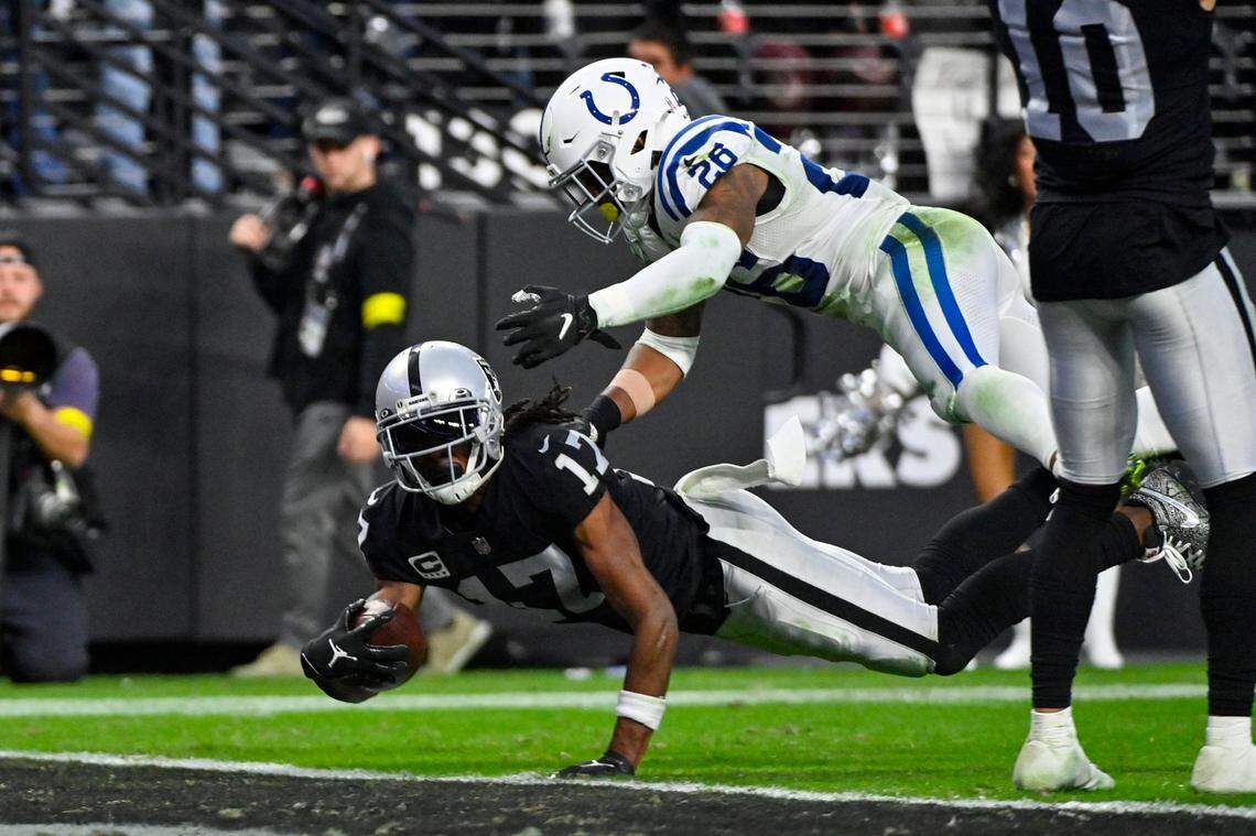 Las Vegas Raiders wide receiver Davante Adams dives for a touchdown. Under Indianapolis Colts safety Rodney McLeod Jr. in the second half of an NFL game in Las Vegas, Fla., Sunday, Nov. 13, 2022.