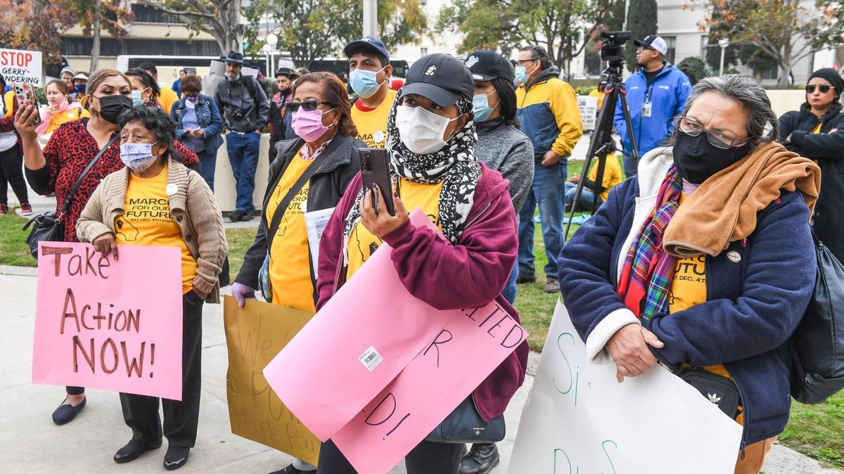 Marchers listen to speakers demanding fairness in redistricting Saturday, Dec. 4, 2021, at the Fresno County Courthouse after marching through downtown Fresno.