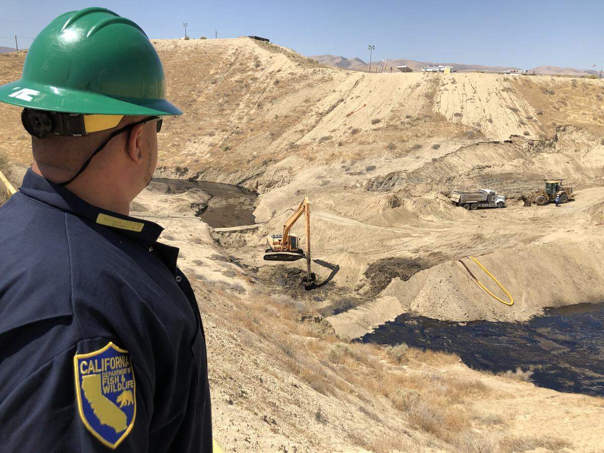 Cleanup of an oil spill that started May 10 continues in a Kern County canyon. Chevron, the company responsible for the spill, faces pressure from the state to fix the problem.