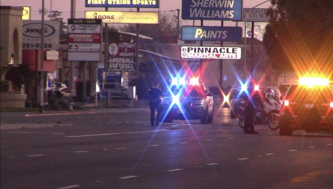 Fresno police closed off a section of Blackstone Avenue on Saturday, Feb. 5, 2022, after a motorcyclist was killed in a collision with a pickup truck.