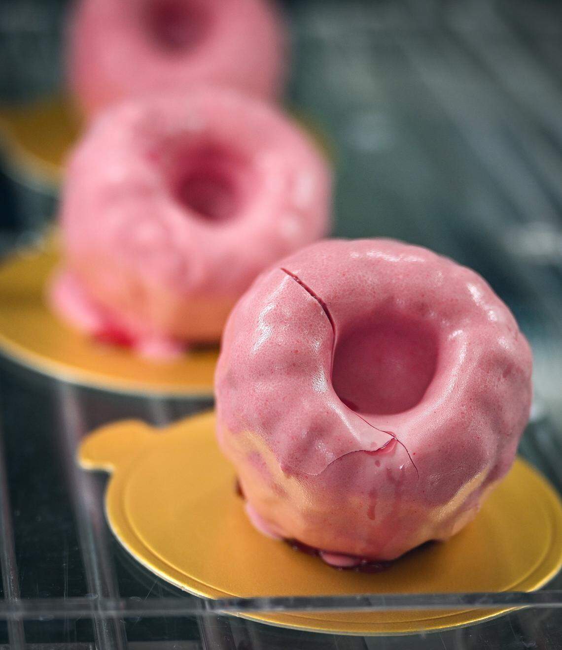 Various treats and baked goods, including ones made to look like giant raspberries, are displayed in the cabinet Lodéi Bakery & Cafe, an Armenian family-owned bakery on the northeast corner of Palm and Bullard avenues.