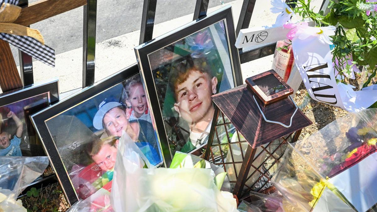 Photographs pay tribute to the victims of a fiery crash that occurred on Friday, May 2 at Clovis Avenue at Shields in Fresno appear in a memorial left at the scene, on Monday, May 5, 2025.
