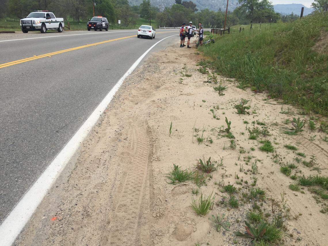 Sand and gravel cover almost the entire bike lane along northbound Auberry Road on March 19, 2017. This photograph was taken by the California Highway Patrol shortly after the accident that left cyclists Melissa Rose and David Bray injured.