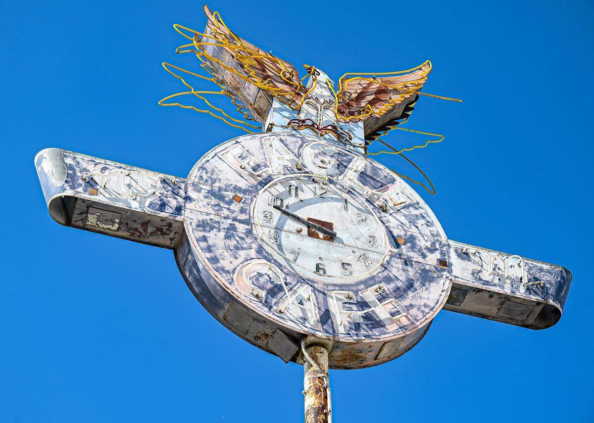 Although the Eagle Cafe has been closed since 1978, its signature eagle clock still stands atop of a pole on the south side of the building.