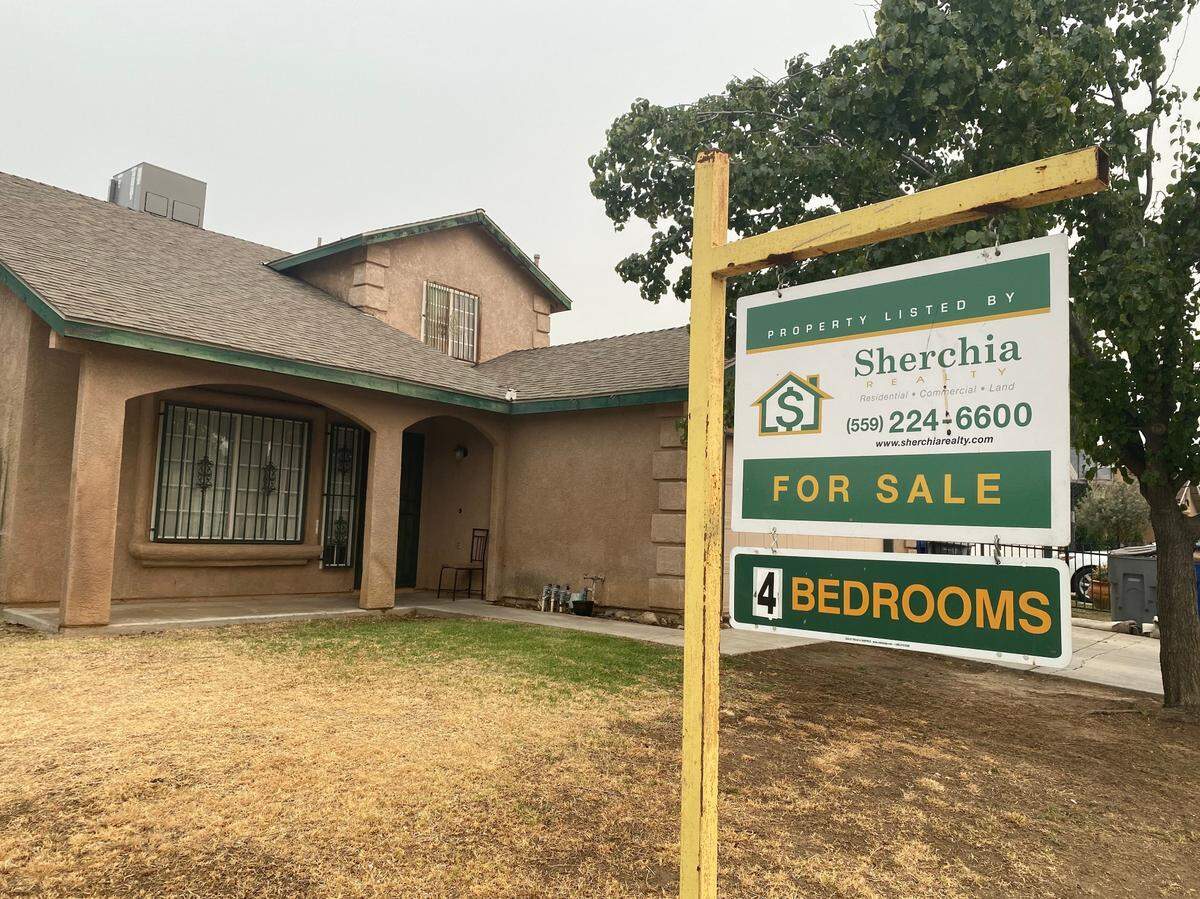 This four-bedroom home in the 93727 ZIP code of Fresno displays its for-sale sign. Open houses must now be scheduled appointments that enforce masks and a limit of two people.  