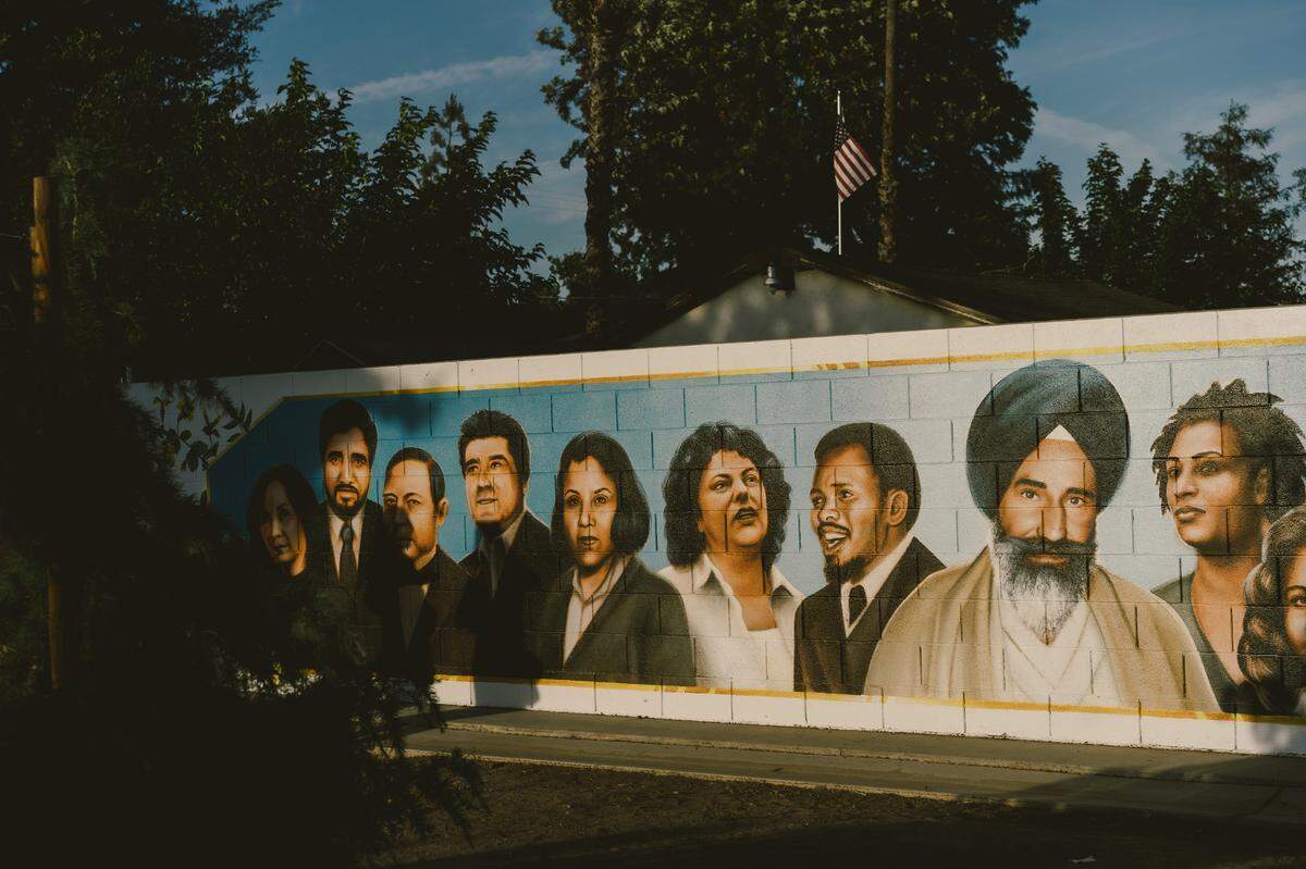 A mural at Jaswant Singh Khalra Neighborhood Park in Fresno honoring civil rights activists who lost their lives while serving their communities. The mural prominently features Jaswant Singh Khalra, for whom the park is named.