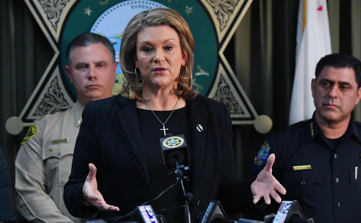 Fresno County District Attorney Lisa Smittcamp, center, with Fresno County Sheriff John Zanoni, left, and Selma Police Chief Rudy Alcaraz, right, speak at a press conference Friday, Feb 3, 2023 in Fresno. Fresno County voters passed a measure to keep election cycles for the district attorney and and sheriff in non-presidential years during the March primary elections.