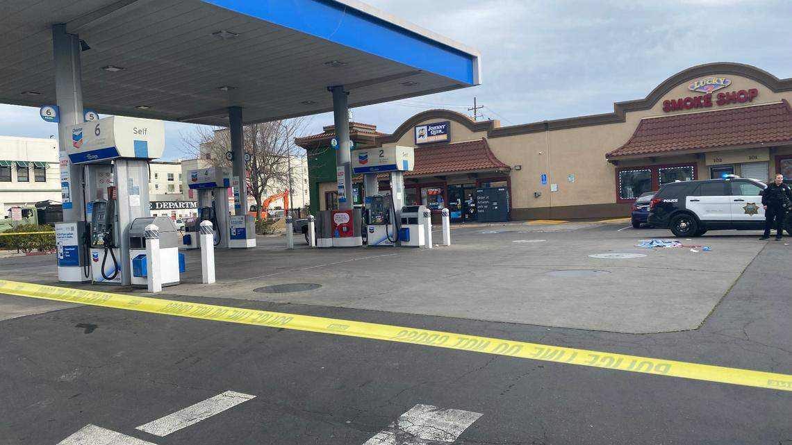 Officers taped off Chevron, located at Fresno and E streets in Fresno, California, after a man was shot on Monday, Feb. 3, 2025.