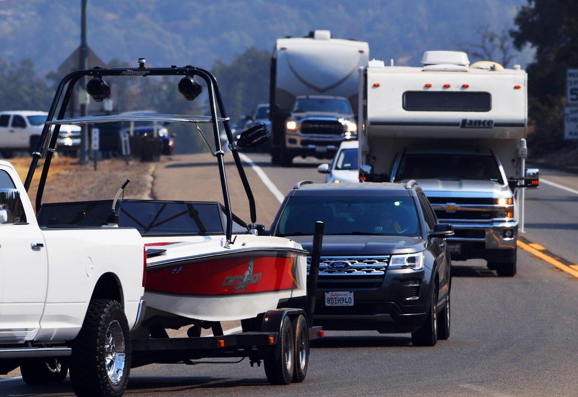 Traffic comes to a stop at Highway 168 and Lodge Road, the bottom of the “four-lane,” as residents are evacuated and roads closed for a wildfire Saturday, Sept. 5, 2020 near Shaver Lake. The fire, reported at 600 acres and zero containment, was reported Friday night around 6:30 p.m.