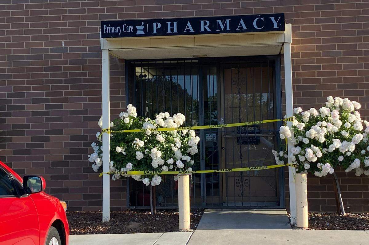 Crime scene tape blocked off the entry to Primary Care Pharmacy on Kings Canyon Road near Clovis Avenue after a burglary on Thursday, March 14, 2022, according to the Fresno County Sheriff’s Office.