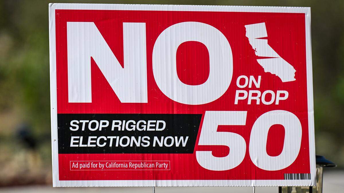 A No on Proposition 50 sign posted front of a home on Tuesday, Oct. 7, 2025. California's Proposition 50 is a ballot measure that authorizes the state legislature to temporarily redraw the state's congressional district maps in response to partisan redistricting efforts in other states, primarily Texas. It will be put before voters in a special election on November 4, 2025.