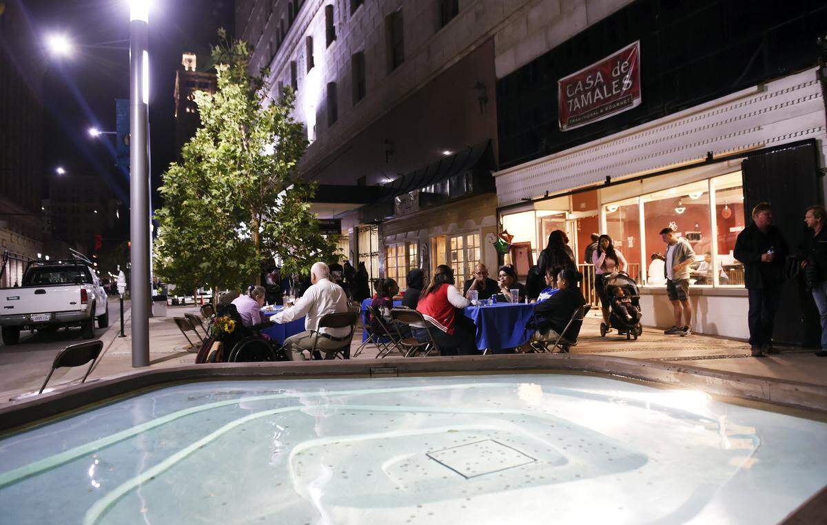 Tables and seating alongside fountainsoutside Casa de Tamales along Fulton following Fulton Street’s official opening earlier Saturday, Oct. 21, 2017 in Fresno.