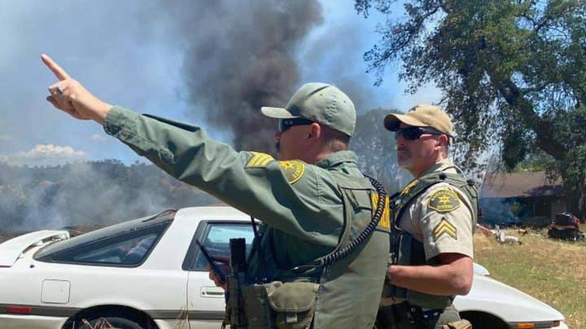 A wildfire destroyed part of a Madera County residence Saturday afternoon. An outbuilding was completely totaled, and the nearby home suffered significant damage to the attic and a bedroom, according to the Madera County Fire Department.