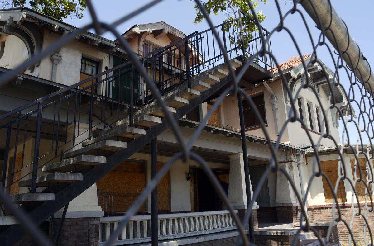 The front of Wolfe Manor in Clovis is seen on Thursday, May 15, 2014.
