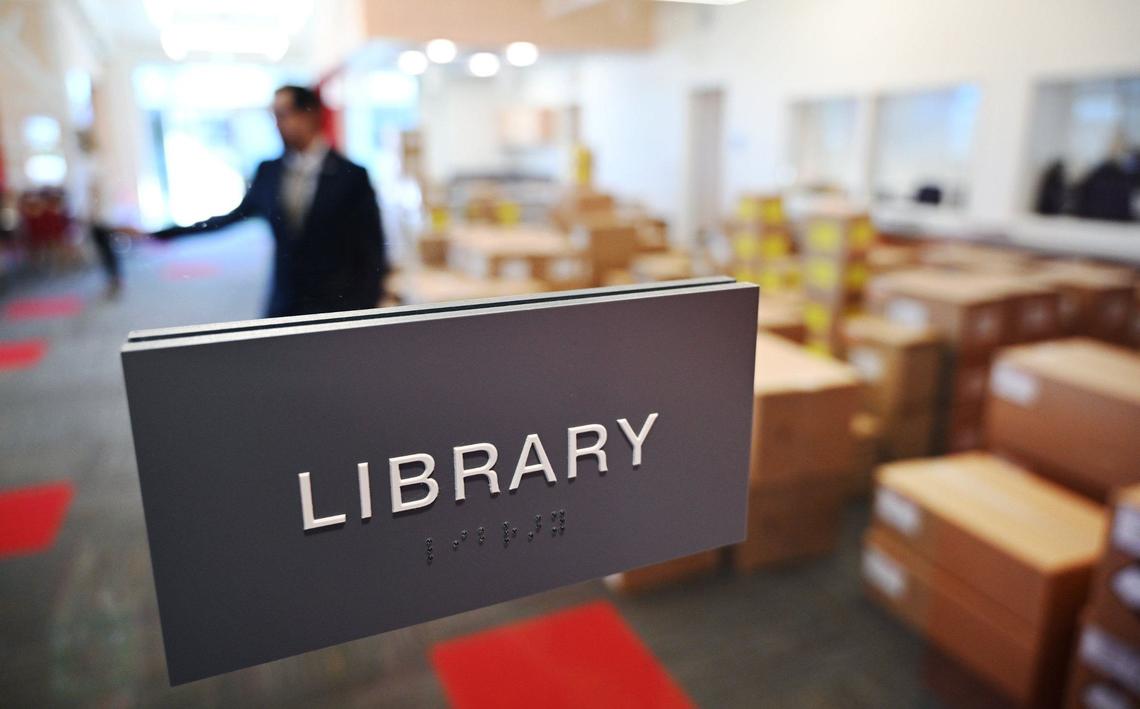 Boxes await unpacking in the library at Clovis Unified’s newest school Hirayama Elementary, seen Wednesday morning, Aug. 14, 2024 in Fresno.
