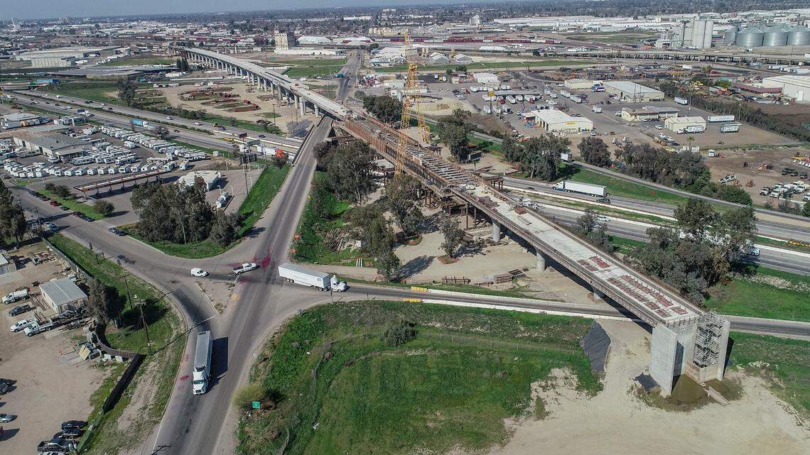 A bridge for the California High Speed Rail crosses Highway 99 and Cedar Avenue during construction of the high-speed railway on Thursday, March 4, 2021.