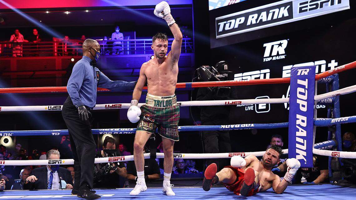 Josh Taylor celebrates after knocking down Jose Ramirez during their fight for the undisputed junior welterweight championship at Virgin Hotels Las Vegas on May 22, 2021, in Las Vegas, Nevada.