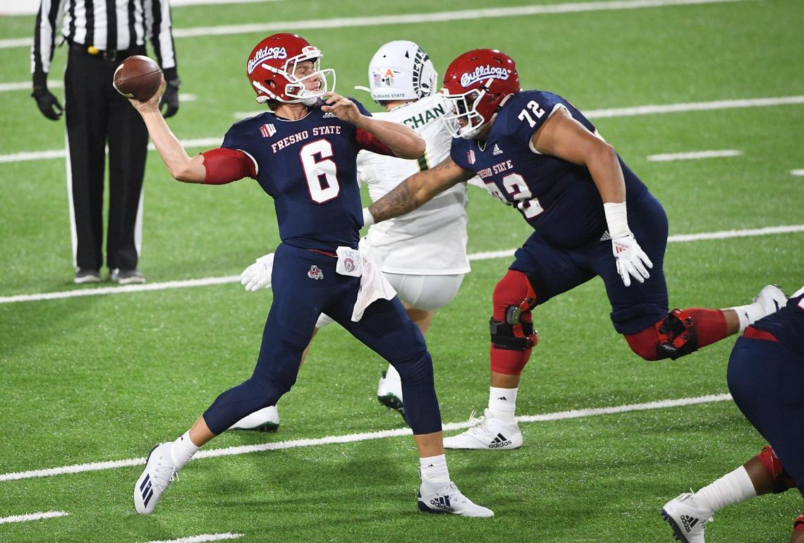 Fresno State backup quarterback Ben Wooldridge throws during a brief appearance in the first half against Colorado State during their game at Bulldog Stadium on Thursday, Oct. 29, 2020.
