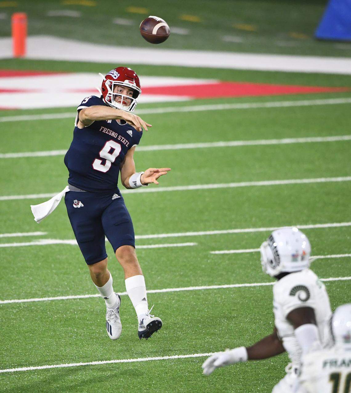 Fresno State quarterback Jake Haener throws against Colorado State during the Bulldogs’ Mountain West Conference game at Bulldog Stadium on Thursday, Oct. 29, 2020.
