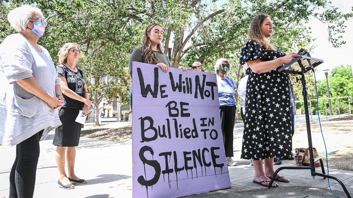 Sarah Roemer, right, a resident of the Oakhurst area, reads a statement about her name being printed on a political flyer from Madera County supervisor candidate Mark Reed as connected to the “Witches and Warlocks” and supporting his “opponent” in the June 7 election, during a press conference in Fresno on Thursday, June 2, 0222.