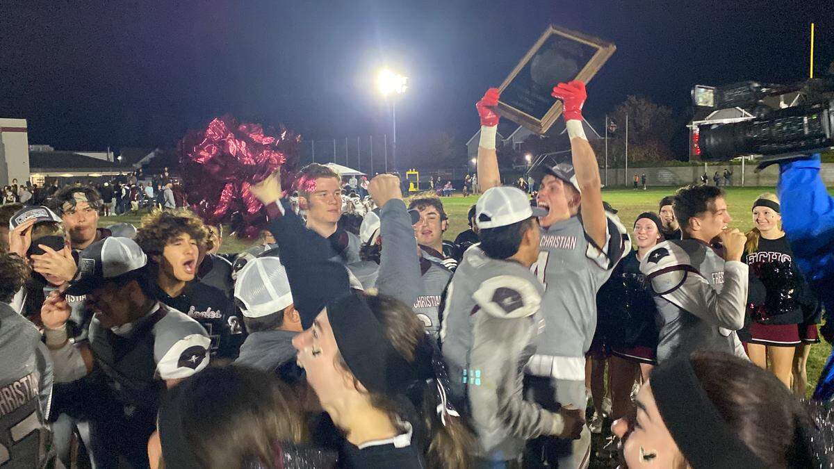 Fresno Christian celebrates a Central Section eight-man championship on Friday, Nov. 17, 2023.