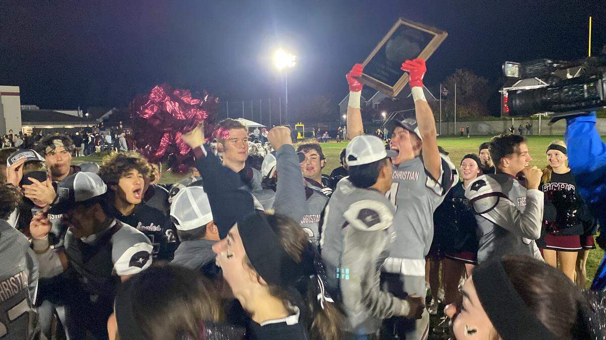 Fresno Christian celebrates a Central Section eight-man championship on Friday, Nov. 17, 2023.