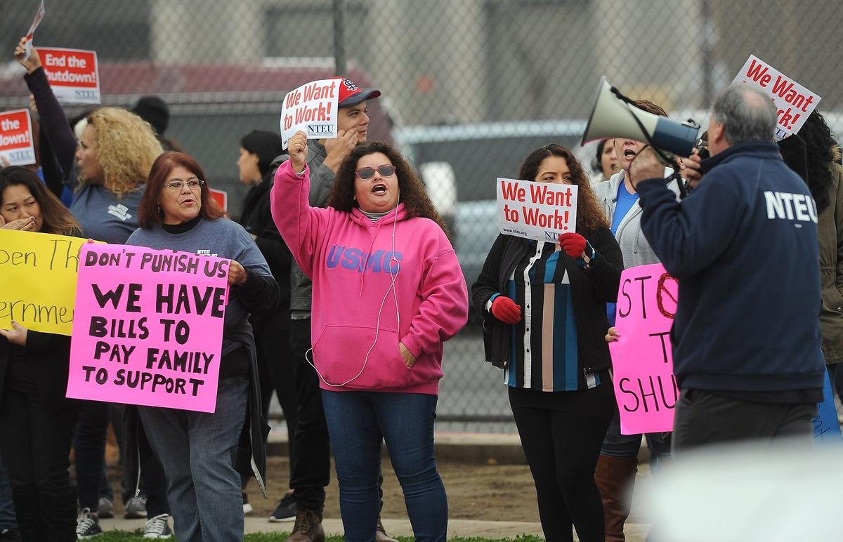 Approximately 125 IRS employees rallied against the government shutdown outside the Fresno Internal Revenue Service Processing Center Thursday morning, Jan. 10, 2019 in Fresno.