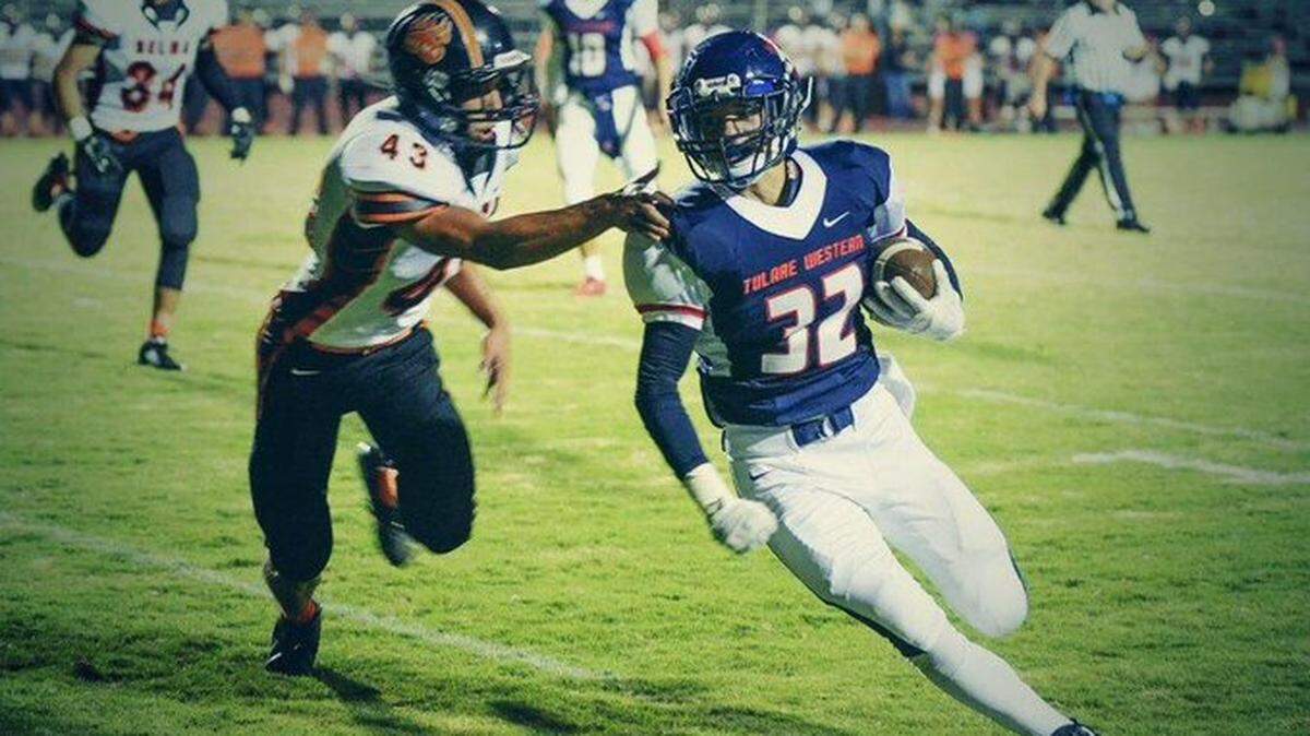 Casey Bernardo, who last played football for the Mustangs in 2014, and his cousin Giovanni Ramirez, a junior at Tulare Western, died in a car crash late last month. Two two were honored before Tulare Western’s homecoming game against Delano on Friday.